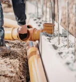 Why Bucks County's Clay Soil Makes Drainage Solutions Essential